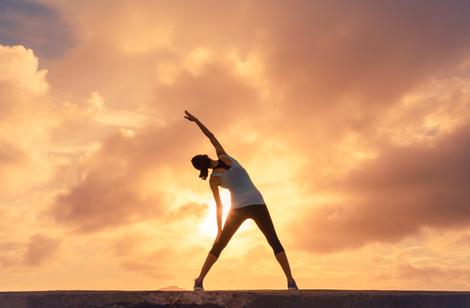 Woman stretching outdoors